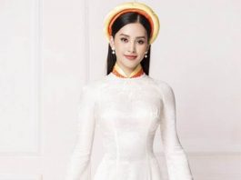Hoa hậu Tiểu Vy đẹp như tiên nữ khi diện áo dài trắng của NTK Ngô Nhật Huy